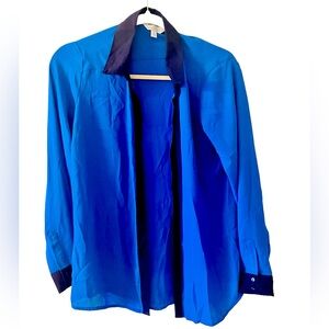Beautiful Cobalt blue & Navy two-tone work blouse. Machine wash. Size Small.